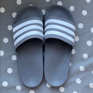 Grey adidas slides